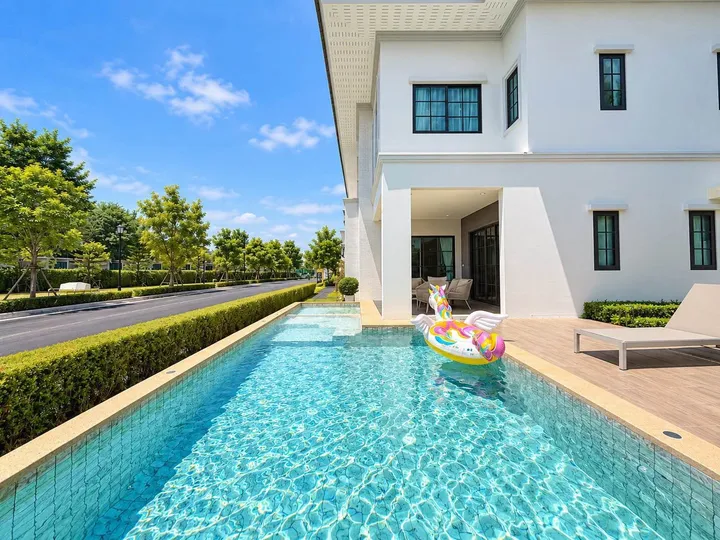 4 Bedroom House for sale in Bang Lamung
